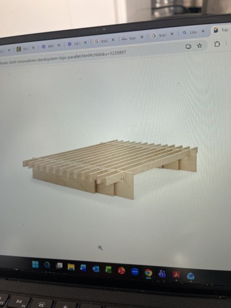 Tojo Innovations - solid beech bed frame.