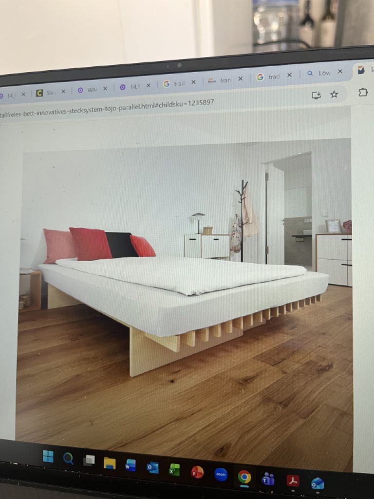 Tojo Innovations - solid beech bed frame.