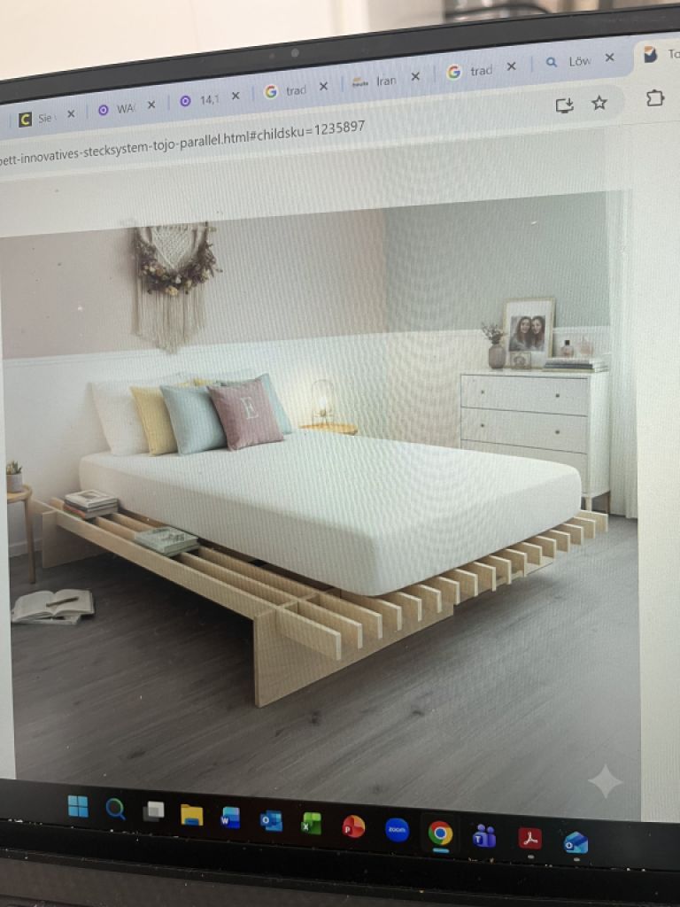 Tojo Innovations - solid beech bed frame.