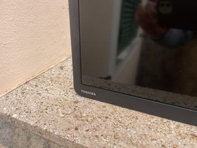 TV - Toshiba television with remote control