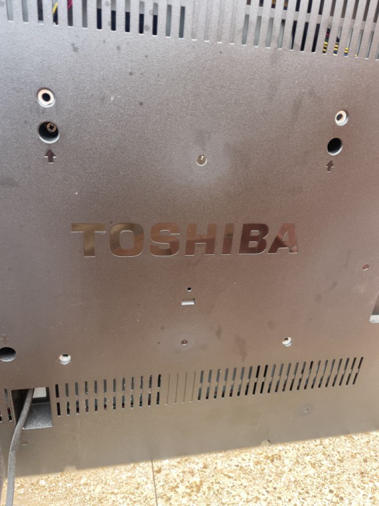 TV - Toshiba television with remote control