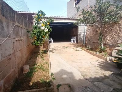Venta de una casa de pueblo de 2 plantas con garaje y patio en Es LLombards - Santanyi - DH 08 VK