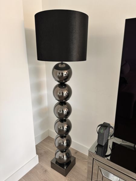 Selling two high-quality designer floor lamps in a modern, elegant style.