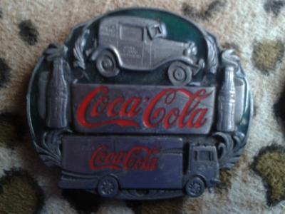 various Coca-Cola belt buckles