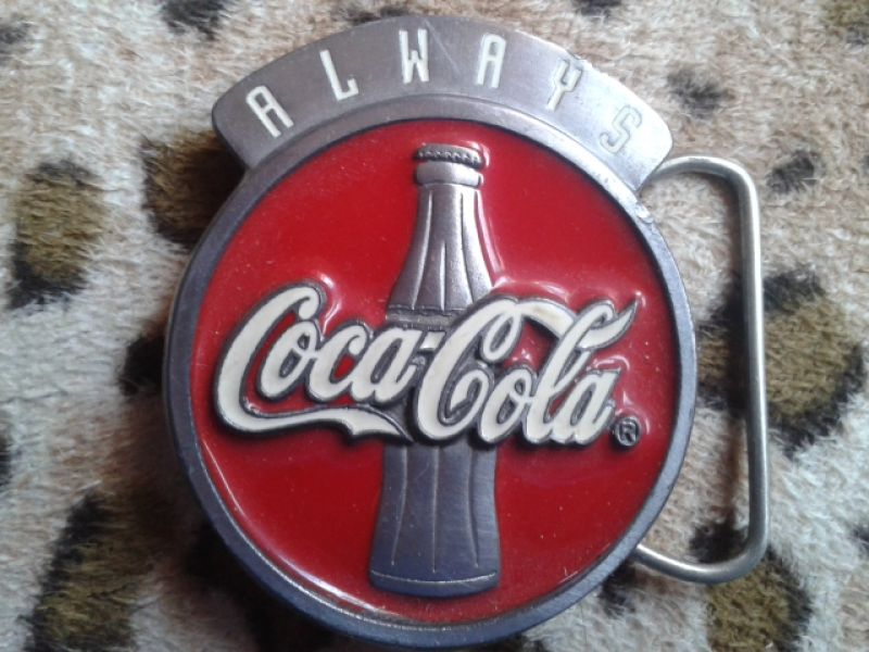 various Coca-Cola belt buckles