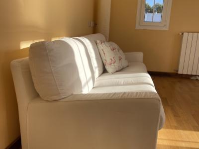 White sofa with slatted frame (sofa bed)