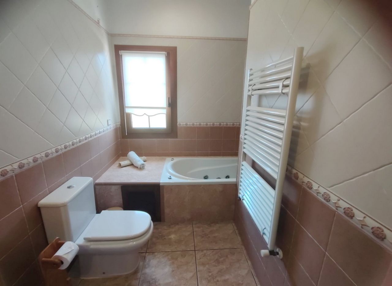 Winter: Ebenerdiges Chalet mit Ölzentralheizung und Garten in ruhiger Lage von Porto Colom  CH 27 WT