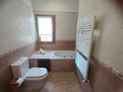 Winter: Ebenerdiges Chalet mit Ölzentralheizung und Garten in ruhiger Lage von Porto Colom  CH 27 WT